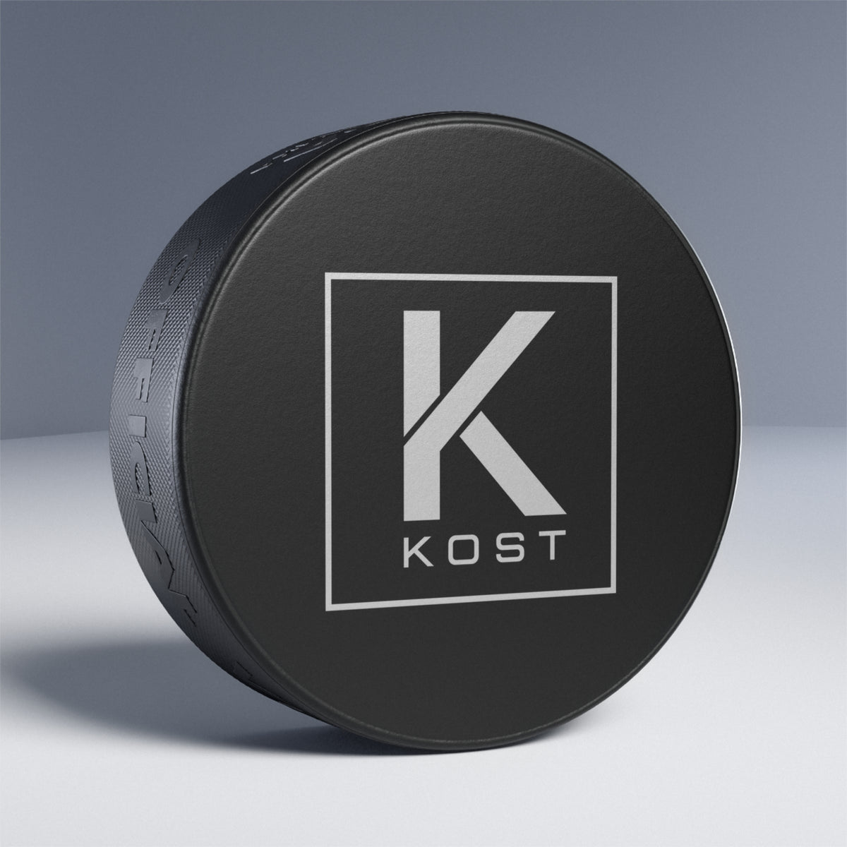 KOST Logo Hockey Puck